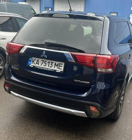 Синий Мицубиси Аутлендер, объемом двигателя 2.36 л и пробегом 203 тыс. км за 14200 $, фото 2 на Automoto.ua