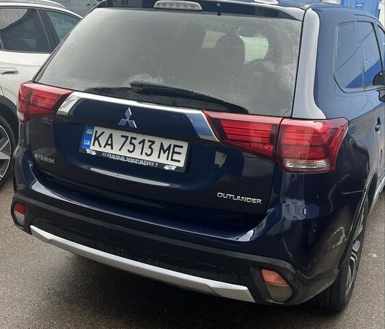 Синий Мицубиси Аутлендер, объемом двигателя 2.4 л и пробегом 202 тыс. км за 14300 $, фото 1 на Automoto.ua