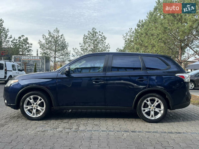Синий Мицубиси Аутлендер, объемом двигателя 2.36 л и пробегом 187 тыс. км за 9999 $, фото 3 на Automoto.ua