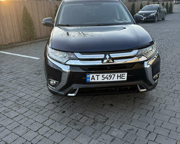 Синий Мицубиси Аутлендер, объемом двигателя 2.38 л и пробегом 99 тыс. км за 15400 $, фото 8 на Automoto.ua