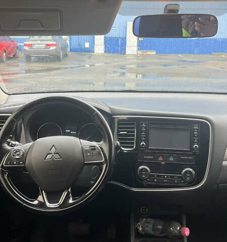 Синий Мицубиси Аутлендер, объемом двигателя 2.36 л и пробегом 203 тыс. км за 14200 $, фото 6 на Automoto.ua