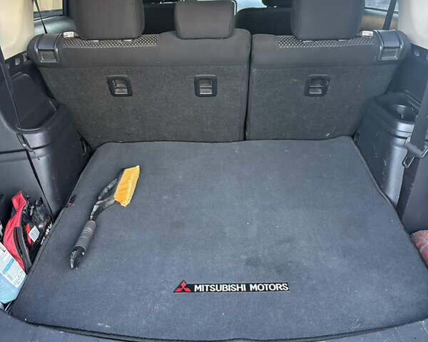 Синий Мицубиси Аутлендер, объемом двигателя 2.38 л и пробегом 99 тыс. км за 15400 $, фото 11 на Automoto.ua