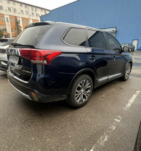 Синий Мицубиси Аутлендер, объемом двигателя 2.36 л и пробегом 203 тыс. км за 14200 $, фото 3 на Automoto.ua