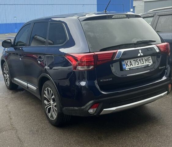 Синий Мицубиси Аутлендер, объемом двигателя 2.4 л и пробегом 202 тыс. км за 14300 $, фото 2 на Automoto.ua