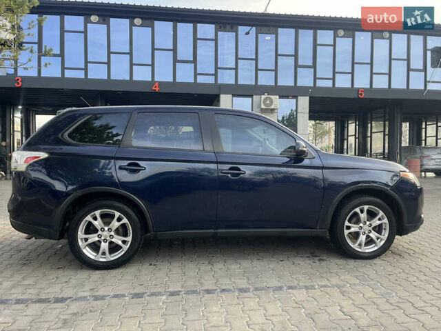 Синий Мицубиси Аутлендер, объемом двигателя 2.36 л и пробегом 187 тыс. км за 9999 $, фото 7 на Automoto.ua