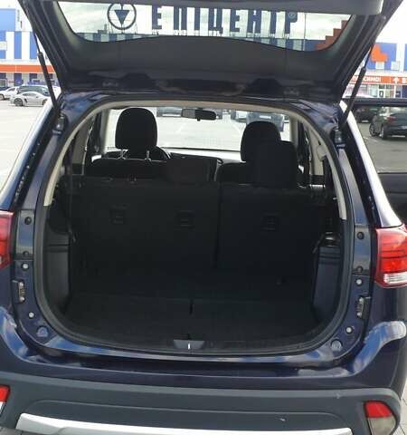 Синій Міцубісі Аутлендер, об'ємом двигуна 2.36 л та пробігом 161 тис. км за 14400 $, фото 30 на Automoto.ua