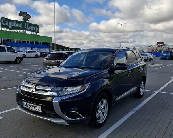 Синій Міцубісі Аутлендер, об'ємом двигуна 2.36 л та пробігом 161 тис. км за 14400 $, фото 2 на Automoto.ua