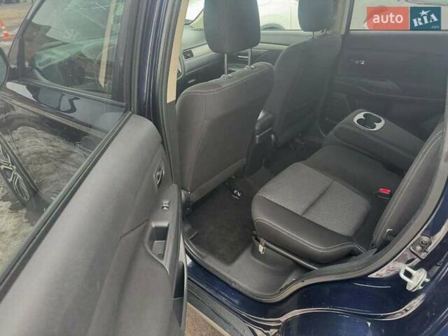 Синий Мицубиси Аутлендер, объемом двигателя 2.36 л и пробегом 195 тыс. км за 13450 $, фото 9 на Automoto.ua