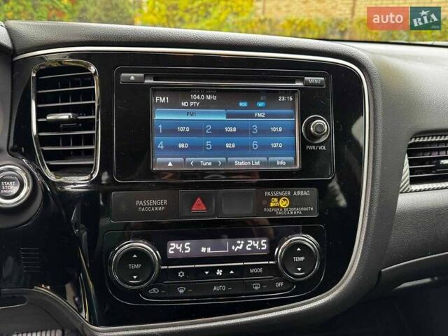 Синий Мицубиси Аутлендер, объемом двигателя 2 л и пробегом 238 тыс. км за 14940 $, фото 16 на Automoto.ua