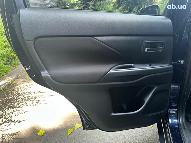 Синій Міцубісі Аутлендер, об'ємом двигуна 2 л та пробігом 238 тис. км за 15990 $, фото 17 на Automoto.ua