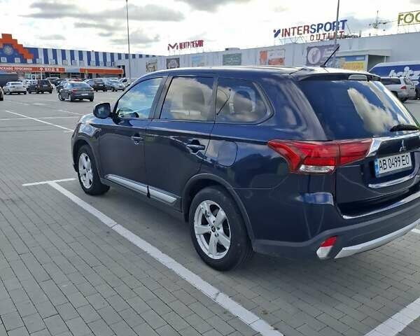 Синій Міцубісі Аутлендер, об'ємом двигуна 2.36 л та пробігом 161 тис. км за 14400 $, фото 4 на Automoto.ua