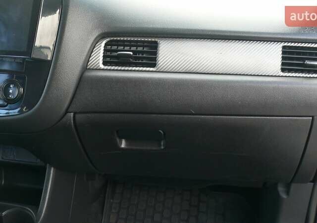 Синій Міцубісі Аутлендер, об'ємом двигуна 2.36 л та пробігом 161 тис. км за 14400 $, фото 18 на Automoto.ua