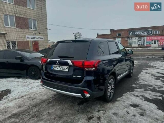 Синий Мицубиси Аутлендер, объемом двигателя 2.36 л и пробегом 195 тыс. км за 13450 $, фото 5 на Automoto.ua