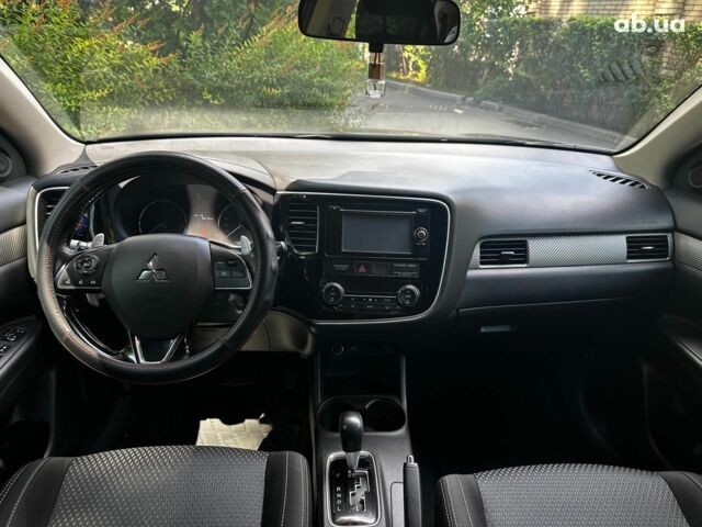 Синій Міцубісі Аутлендер, об'ємом двигуна 2 л та пробігом 238 тис. км за 15990 $, фото 19 на Automoto.ua
