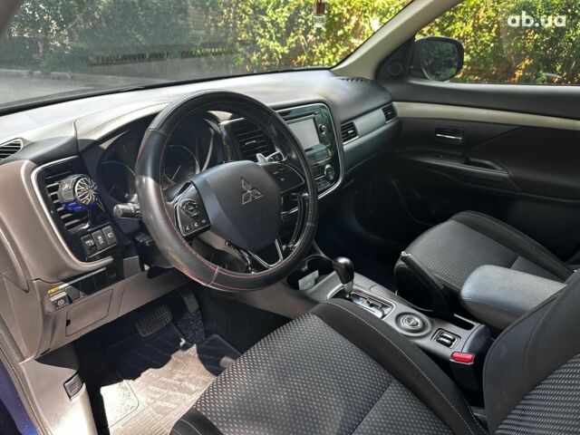 Синій Міцубісі Аутлендер, об'ємом двигуна 2 л та пробігом 238 тис. км за 15990 $, фото 9 на Automoto.ua