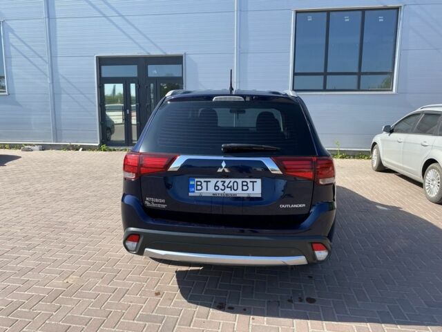 Синій Міцубісі Аутлендер, об'ємом двигуна 2.4 л та пробігом 68 тис. км за 15000 $, фото 1 на Automoto.ua