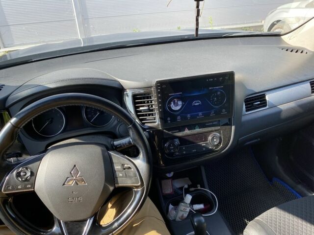 Синій Міцубісі Аутлендер, об'ємом двигуна 2.4 л та пробігом 68 тис. км за 15000 $, фото 5 на Automoto.ua