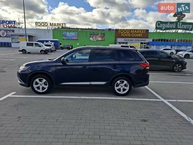 Синій Міцубісі Аутлендер, об'ємом двигуна 2.36 л та пробігом 161 тис. км за 14400 $, фото 5 на Automoto.ua