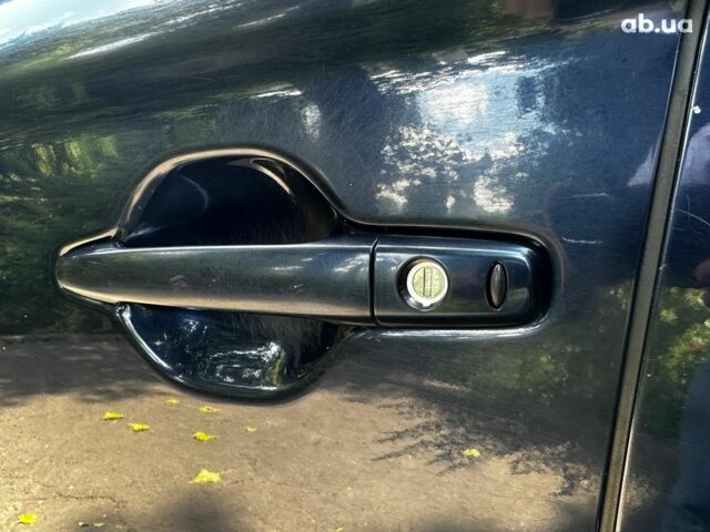 Синій Міцубісі Аутлендер, об'ємом двигуна 2 л та пробігом 238 тис. км за 15990 $, фото 7 на Automoto.ua