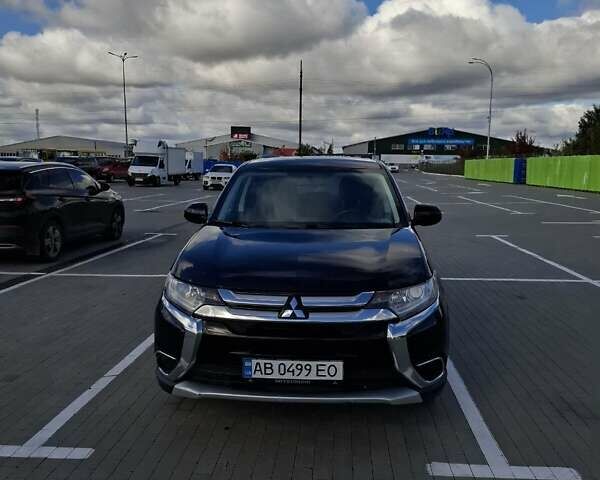 Синій Міцубісі Аутлендер, об'ємом двигуна 2.36 л та пробігом 161 тис. км за 14400 $, фото 1 на Automoto.ua