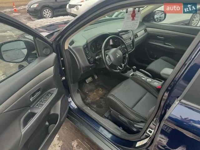 Синий Мицубиси Аутлендер, объемом двигателя 2.36 л и пробегом 195 тыс. км за 13450 $, фото 8 на Automoto.ua