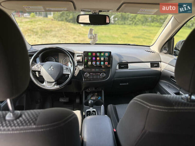 Синий Мицубиси Аутлендер, объемом двигателя 3 л и пробегом 157 тыс. км за 15000 $, фото 26 на Automoto.ua