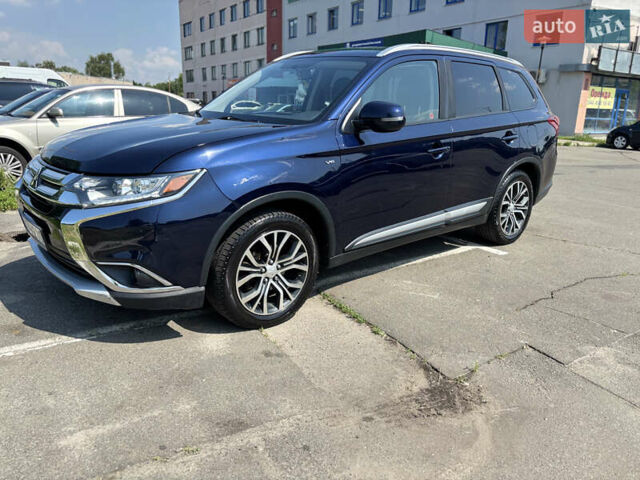 Синий Мицубиси Аутлендер, объемом двигателя 3 л и пробегом 157 тыс. км за 15000 $, фото 2 на Automoto.ua