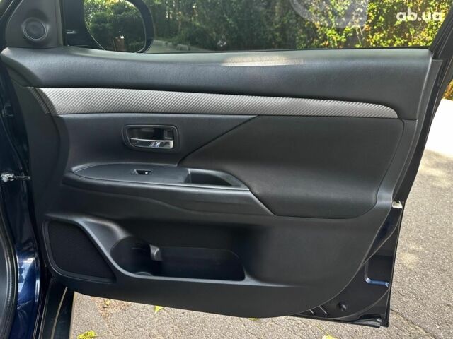 Синій Міцубісі Аутлендер, об'ємом двигуна 2 л та пробігом 238 тис. км за 15990 $, фото 23 на Automoto.ua