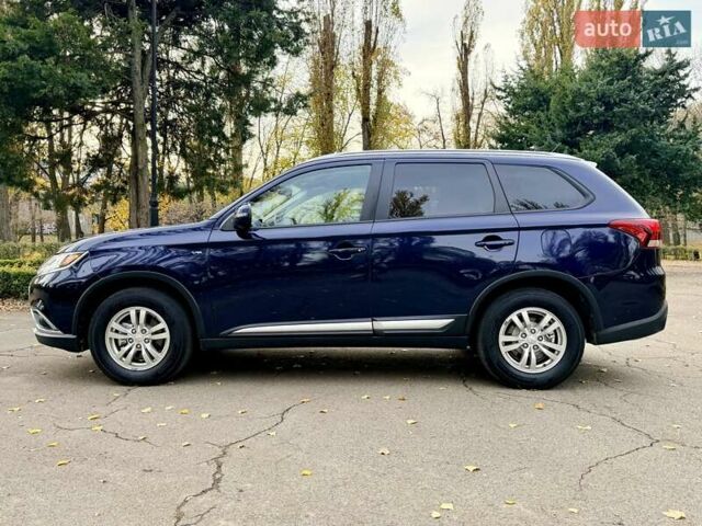 Синий Мицубиси Аутлендер, объемом двигателя 3 л и пробегом 123 тыс. км за 15900 $, фото 3 на Automoto.ua
