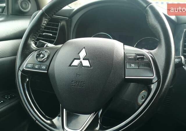 Синій Міцубісі Аутлендер, об'ємом двигуна 2.36 л та пробігом 161 тис. км за 14400 $, фото 12 на Automoto.ua