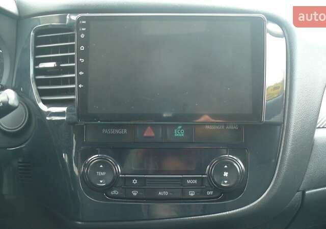 Синій Міцубісі Аутлендер, об'ємом двигуна 2.36 л та пробігом 161 тис. км за 14400 $, фото 15 на Automoto.ua