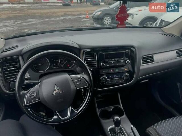 Синий Мицубиси Аутлендер, объемом двигателя 2.36 л и пробегом 195 тыс. км за 13450 $, фото 10 на Automoto.ua