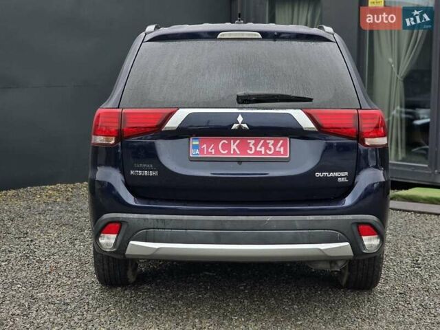 Синий Мицубиси Аутлендер, объемом двигателя 2.4 л и пробегом 134 тыс. км за 13999 $, фото 18 на Automoto.ua