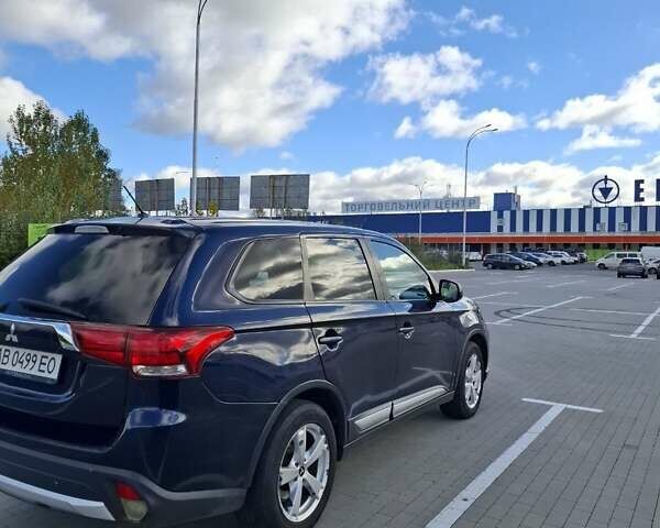 Синій Міцубісі Аутлендер, об'ємом двигуна 2.36 л та пробігом 161 тис. км за 14400 $, фото 3 на Automoto.ua