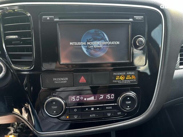 Синій Міцубісі Аутлендер, об'ємом двигуна 2 л та пробігом 238 тис. км за 15990 $, фото 14 на Automoto.ua