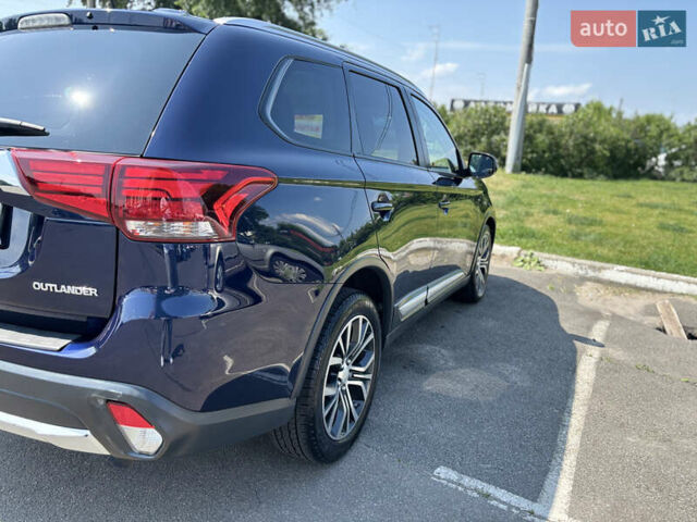 Синий Мицубиси Аутлендер, объемом двигателя 3 л и пробегом 157 тыс. км за 15000 $, фото 7 на Automoto.ua