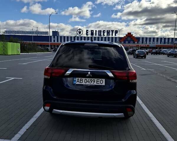 Синій Міцубісі Аутлендер, об'ємом двигуна 2.36 л та пробігом 161 тис. км за 14400 $, фото 6 на Automoto.ua