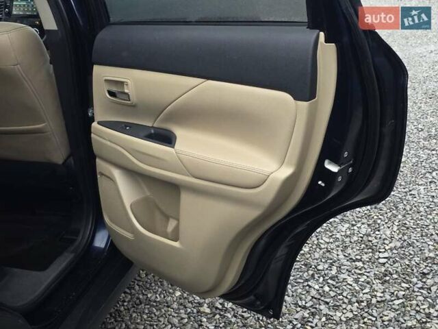 Синий Мицубиси Аутлендер, объемом двигателя 2.4 л и пробегом 134 тыс. км за 13999 $, фото 27 на Automoto.ua