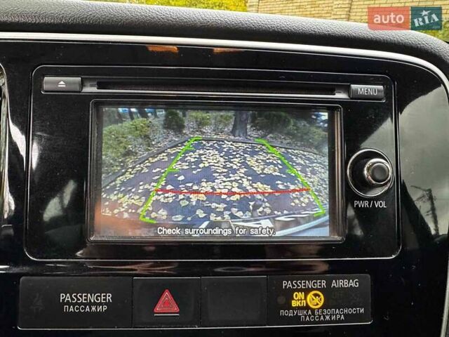 Синий Мицубиси Аутлендер, объемом двигателя 2 л и пробегом 238 тыс. км за 14940 $, фото 17 на Automoto.ua