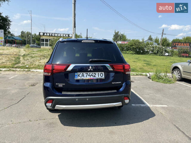 Синий Мицубиси Аутлендер, объемом двигателя 3 л и пробегом 157 тыс. км за 15000 $, фото 5 на Automoto.ua