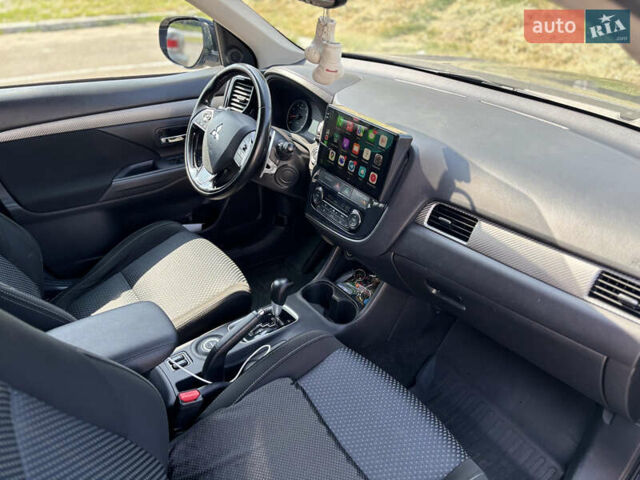 Синий Мицубиси Аутлендер, объемом двигателя 3 л и пробегом 157 тыс. км за 15000 $, фото 11 на Automoto.ua