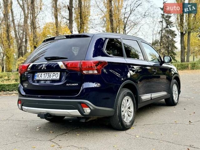Синий Мицубиси Аутлендер, объемом двигателя 3 л и пробегом 123 тыс. км за 15900 $, фото 6 на Automoto.ua