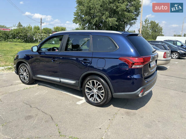 Синий Мицубиси Аутлендер, объемом двигателя 3 л и пробегом 157 тыс. км за 15000 $, фото 4 на Automoto.ua