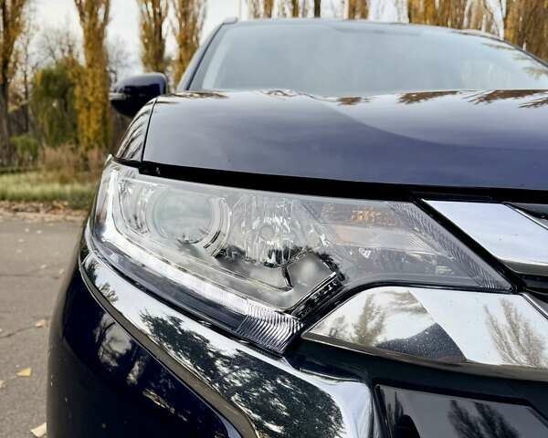 Синий Мицубиси Аутлендер, объемом двигателя 3 л и пробегом 123 тыс. км за 15900 $, фото 9 на Automoto.ua