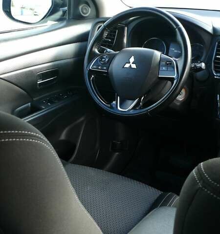 Синій Міцубісі Аутлендер, об'ємом двигуна 2.36 л та пробігом 161 тис. км за 14400 $, фото 11 на Automoto.ua