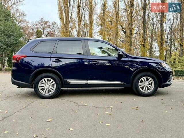 Синий Мицубиси Аутлендер, объемом двигателя 3 л и пробегом 123 тыс. км за 15900 $, фото 7 на Automoto.ua