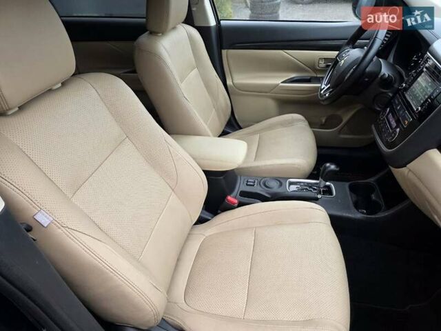 Синий Мицубиси Аутлендер, объемом двигателя 2.4 л и пробегом 134 тыс. км за 13999 $, фото 26 на Automoto.ua