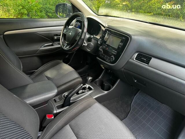 Синій Міцубісі Аутлендер, об'ємом двигуна 2 л та пробігом 238 тис. км за 15990 $, фото 24 на Automoto.ua