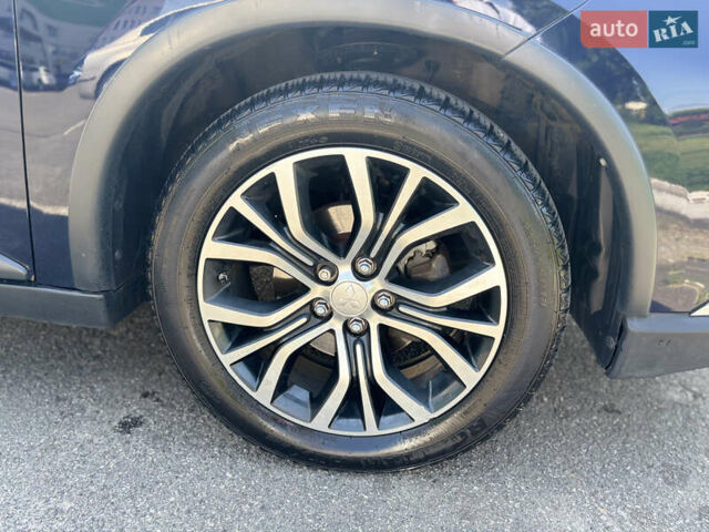 Синий Мицубиси Аутлендер, объемом двигателя 3 л и пробегом 157 тыс. км за 15000 $, фото 10 на Automoto.ua