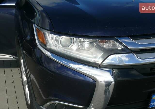 Синій Міцубісі Аутлендер, об'ємом двигуна 2.36 л та пробігом 161 тис. км за 14400 $, фото 9 на Automoto.ua